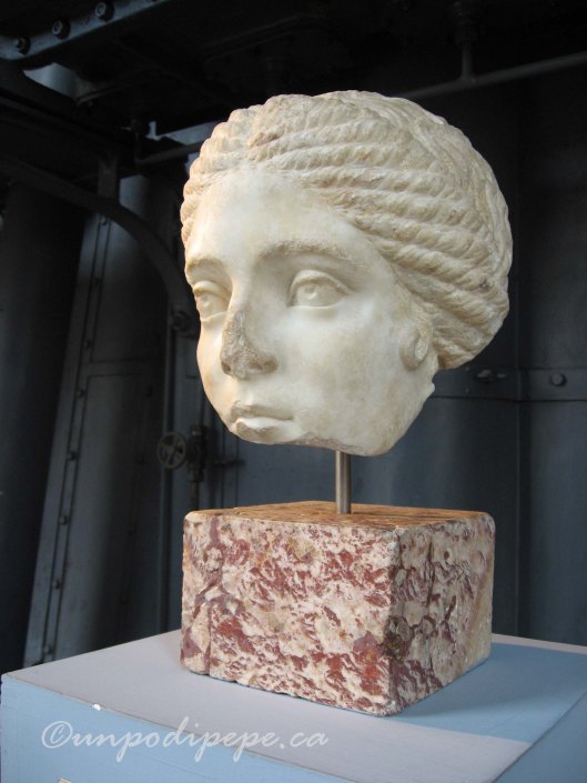 Partial female head, discovered in the garden of Villa Rivaldi in 1933 during construction of Via dei Fori Imperiali